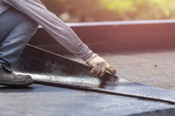 Professional Basement Waterproofing technician working in Roebling, NJ